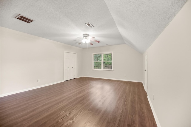 105 Spring St, Summerville, SC 29485 - additional living space with a textured ceiling, ceiling fan, dark wood-type flooring, and lofted ceiling