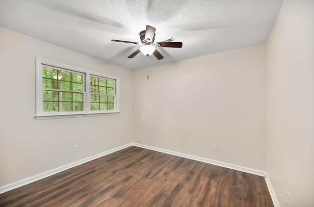 105 Spring St, Summerville, SC 29485 - empty room featuring dark wood-style flooring, a ceiling fan, and a textured ceiling