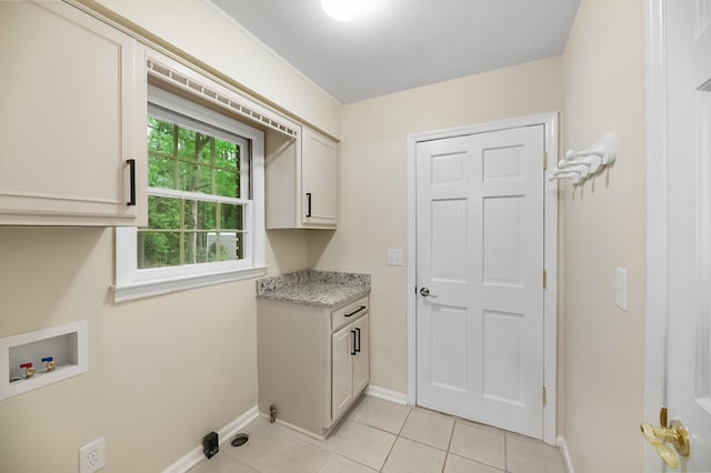105 Spring St, Summerville, SC 29485 - laundry area featuring cabinet space, hookup for a washing machine, and light tile patterned floors