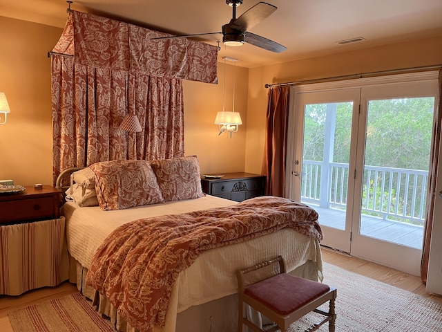 bedroom with ceiling fan, light wood finished floors, visible vents, and access to exterior