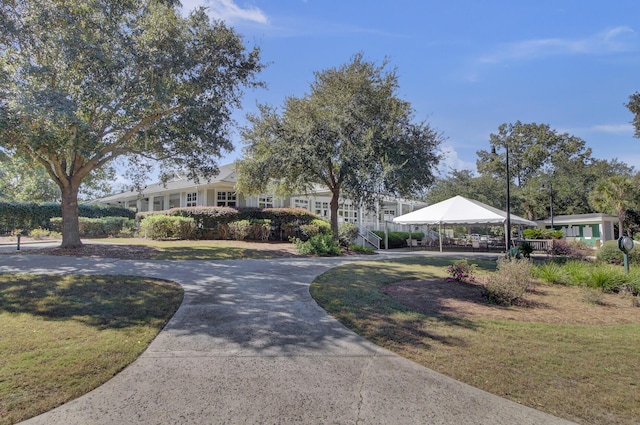 4227 Sawgrass Dr, North Charleston, SC 29420 - surrounding community featuring a gazebo, curved driveway, and a lawn