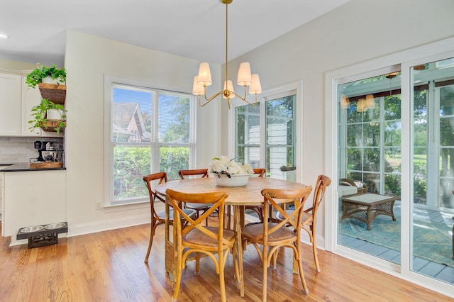 4227 Sawgrass Dr, North Charleston, SC 29420 - dining space with plenty of natural light, light wood-style flooring, baseboards, and a chandelier