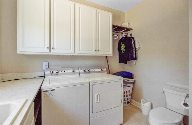 4227 Sawgrass Dr, North Charleston, SC 29420 - laundry room with washer and dryer, light tile patterned floors, and baseboards