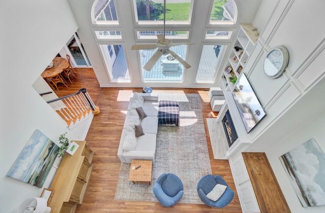 4227 Sawgrass Dr, North Charleston, SC 29420 - living room with a towering ceiling, wood finished floors, and ceiling fan