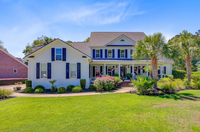 4227 Sawgrass Dr, North Charleston, SC 29420 - view of front of house with covered porch and a front lawn
