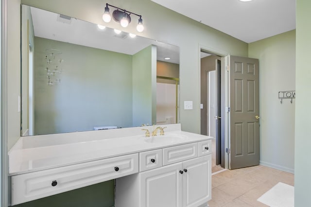 4227 Sawgrass Dr, North Charleston, SC 29420 - bathroom with vanity, tile patterned flooring, and baseboards