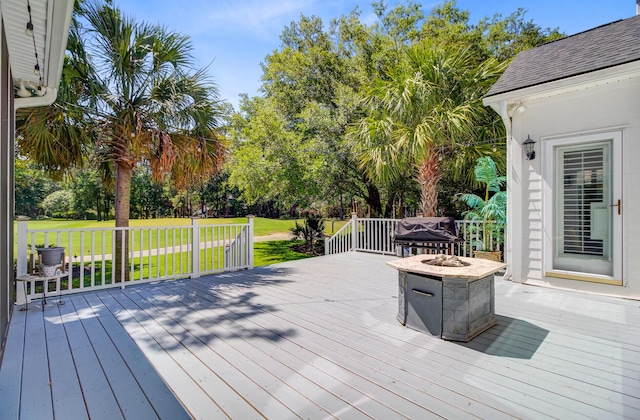 4227 Sawgrass Dr, North Charleston, SC 29420 - wooden terrace with a fire pit and a lawn