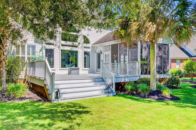 4227 Sawgrass Dr, North Charleston, SC 29420 - back of property featuring a sunroom, a yard, and a deck