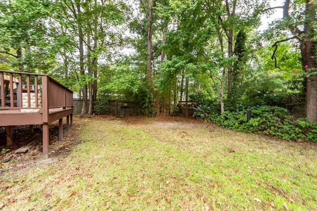 view of yard with a deck