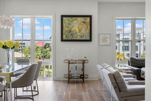 interior space with baseboards and wood finished floors