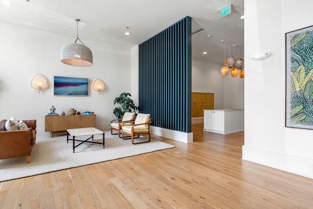 sitting room featuring visible vents, recessed lighting, hardwood / wood-style flooring, and baseboards