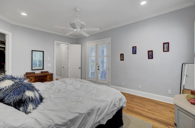 bedroom with access to outside, baseboards, light wood-type flooring, ornamental molding, and recessed lighting