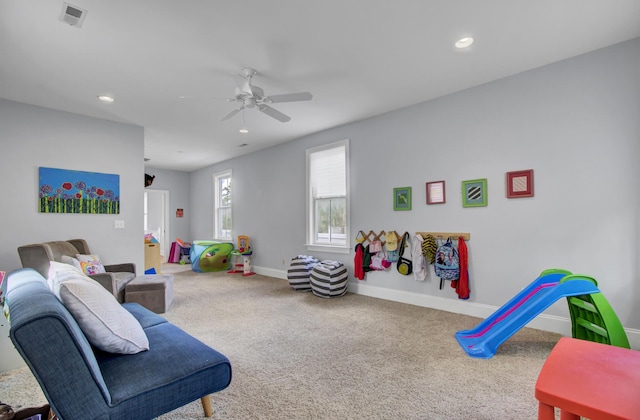 recreation room featuring visible vents, baseboards, a ceiling fan, carpet, and recessed lighting
