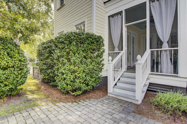 doorway to property with a patio