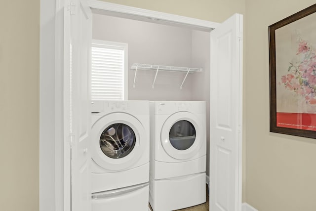 laundry room featuring laundry area and washer and dryer