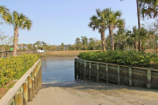 dock area with a water view