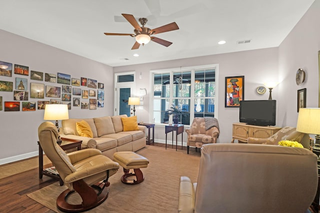 living area with visible vents, baseboards, ceiling fan, recessed lighting, and wood finished floors