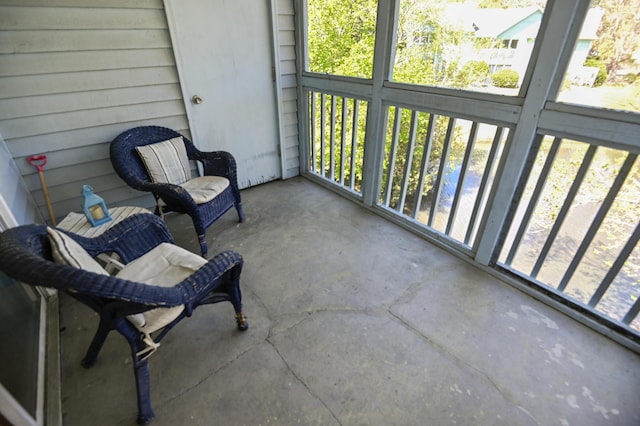 sunroom / solarium featuring plenty of natural light