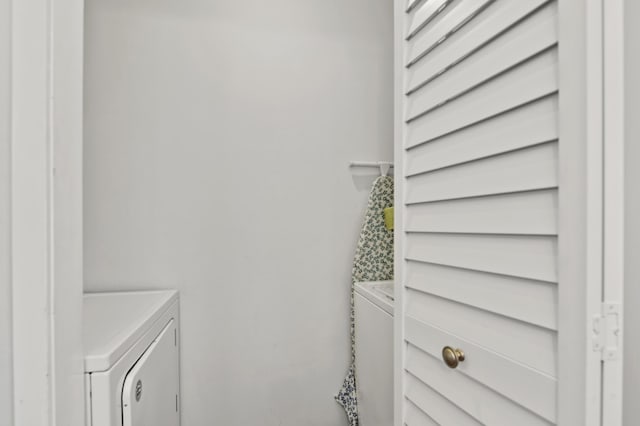 laundry area featuring laundry area and washer and dryer