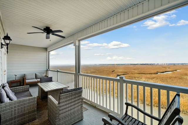 balcony featuring ceiling fan