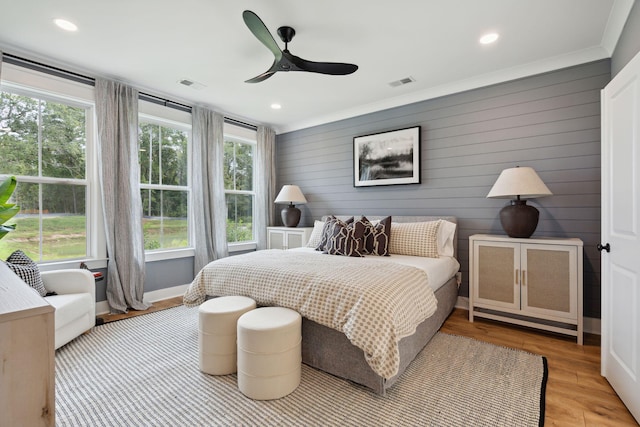 bedroom with visible vents, ceiling fan, light wood finished floors, and recessed lighting