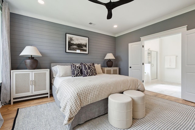 bedroom featuring visible vents, recessed lighting, ornamental molding, and light wood-style flooring