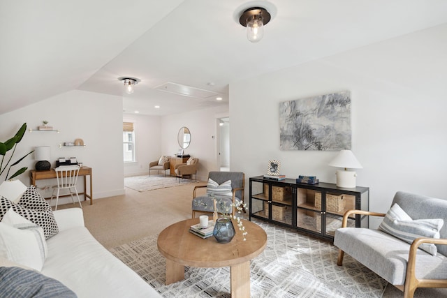 living area with lofted ceiling, carpet flooring, baseboards, attic access, and recessed lighting