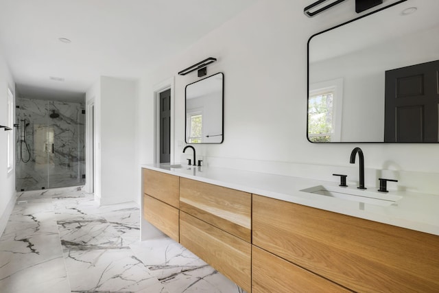 1019 Royalist Rd, Mount Pleasant, SC 29464 - bathroom featuring healthy amount of natural light, marble finish floors, a marble finish shower, and double vanity