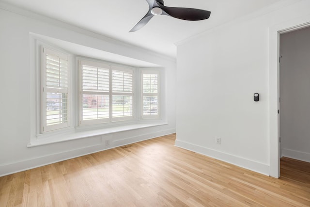 1019 Royalist Rd, Mount Pleasant, SC 29464 - unfurnished room with crown molding, light wood-style flooring, a ceiling fan, and baseboards