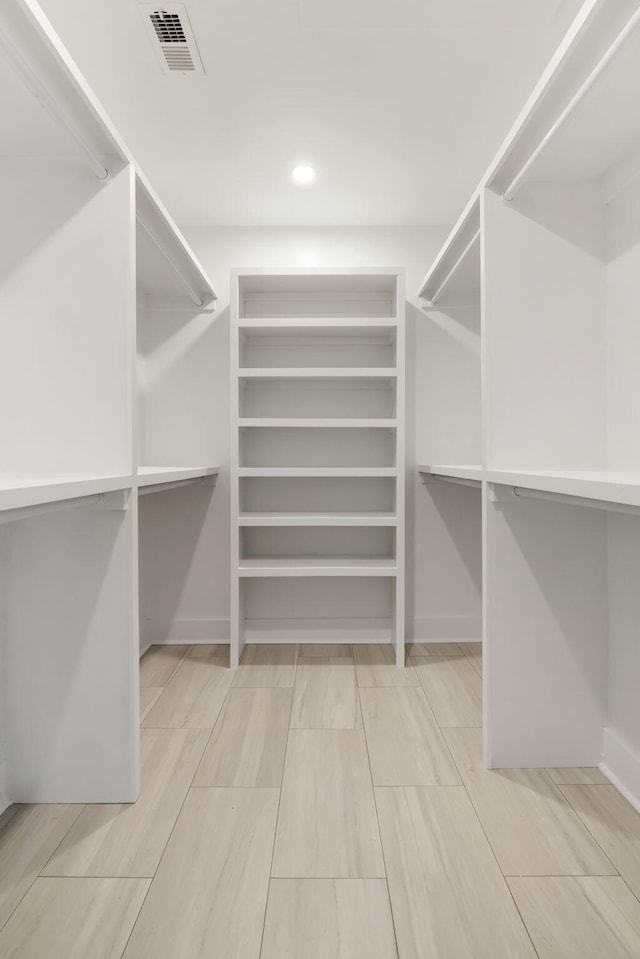 1019 Royalist Rd, Mount Pleasant, SC 29464 - walk in closet with wood finished floors