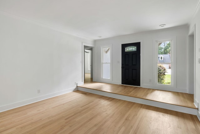 1019 Royalist Rd, Mount Pleasant, SC 29464 - entryway featuring ornamental molding, light wood-style flooring, and baseboards