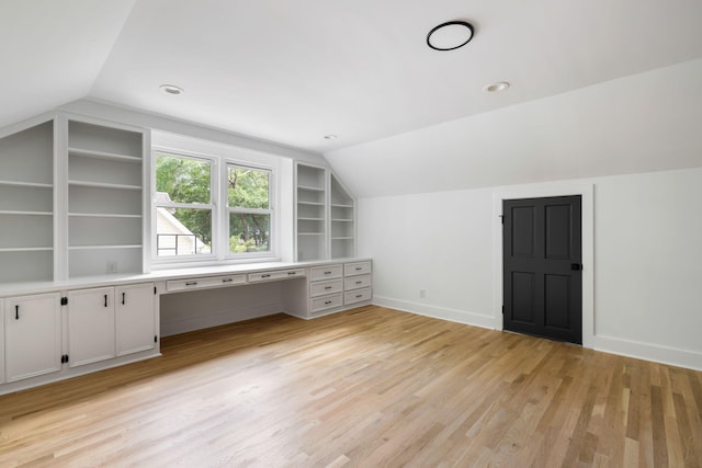 1019 Royalist Rd, Mount Pleasant, SC 29464 - bonus room with vaulted ceiling, built in shelves, baseboards, and light wood-style flooring
