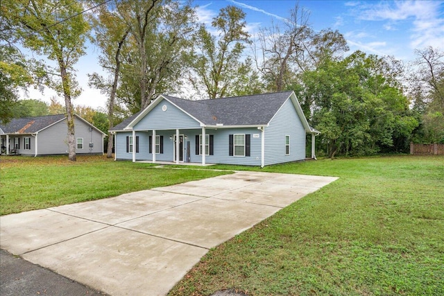 view of front of home with a front lawn and covered porch