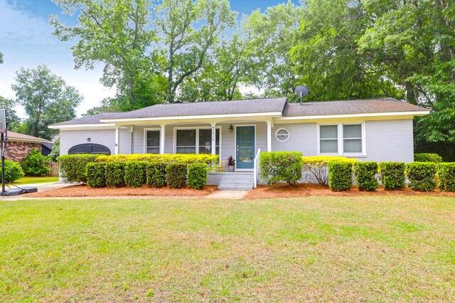 1416 Glencoe Dr, Mount Pleasant, SC 29464 - single story home with covered porch, a front yard, and brick siding