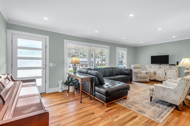 1416 Glencoe Dr, Mount Pleasant, SC 29464 - living area with light wood-style flooring, crown molding, recessed lighting, and baseboards