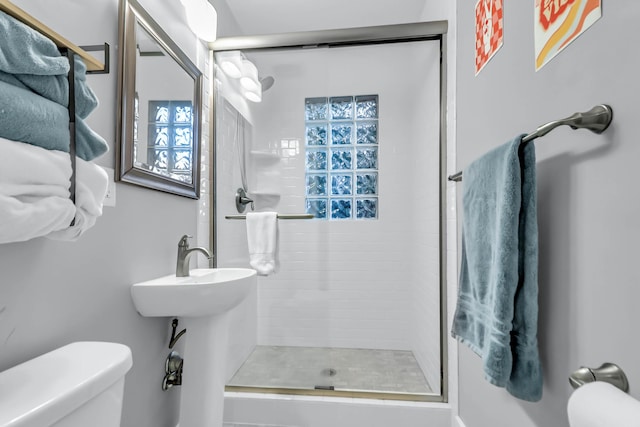 1416 Glencoe Dr, Mount Pleasant, SC 29464 - full bathroom featuring toilet, a shower stall, and plenty of natural light