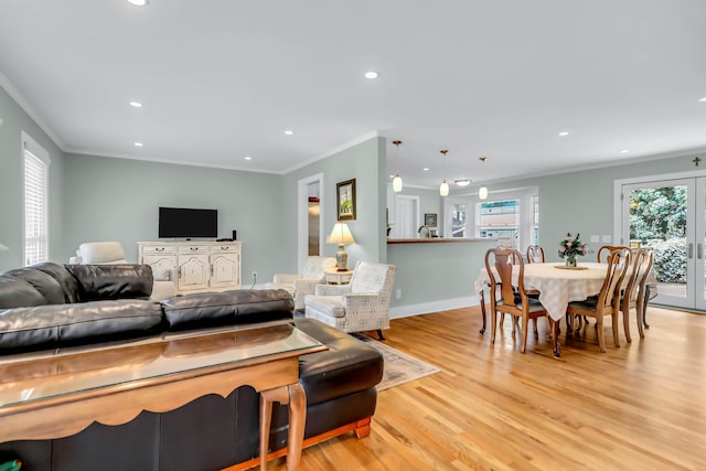 1416 Glencoe Dr, Mount Pleasant, SC 29464 - living room with crown molding, light wood-style floors, recessed lighting, and baseboards