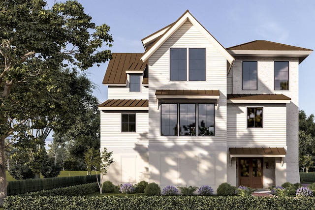 13 Trumbo St, Charleston, SC 29401 - view of front facade featuring a standing seam roof and metal roof