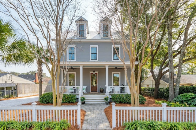 view of front of home featuring a fenced front yard, a porch, and a ceiling fan