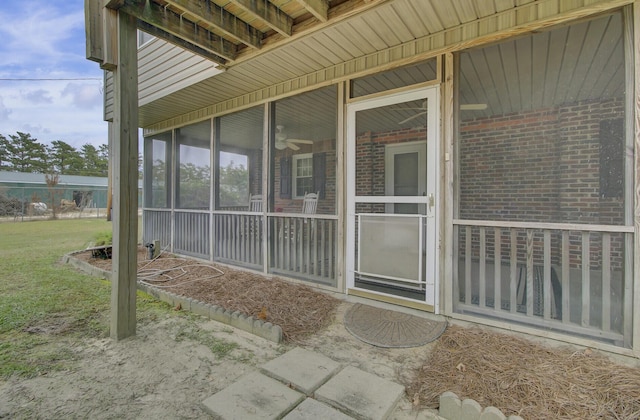 view of patio / terrace with a sunroom