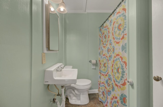 bathroom featuring sink, walk in shower, tile patterned flooring, toilet, and ornamental molding