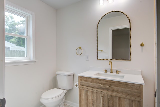 3231 Stonehaven Dr, North Charleston, SC 29420 - bathroom featuring vanity, toilet, and baseboards