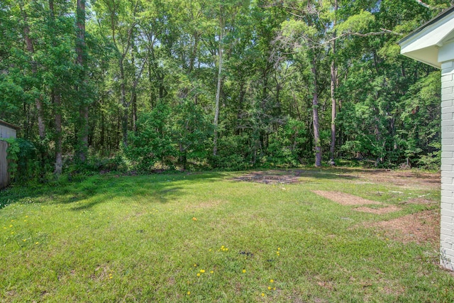 3231 Stonehaven Dr, North Charleston, SC 29420 - view of grassy yard with a view of trees