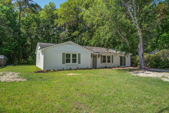 3231 Stonehaven Dr, North Charleston, SC 29420 - ranch-style house featuring a front yard and brick siding
