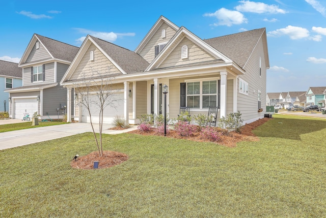 view of front of home with concrete driveway, a front lawn, and roof with shingles