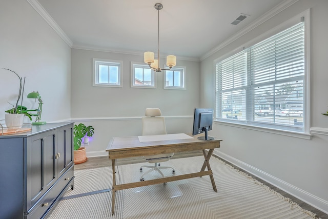 home office with a notable chandelier, baseboards, visible vents, and ornamental molding