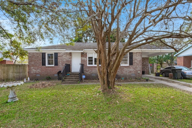 single story home featuring a carport and a front yard