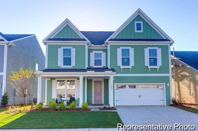 view of front of home with a porch, an attached garage, board and batten siding, and driveway