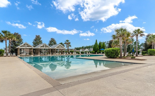 community pool with a patio