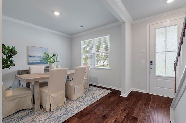 dining space with recessed lighting, wood finished floors, visible vents, ornamental molding, and baseboards